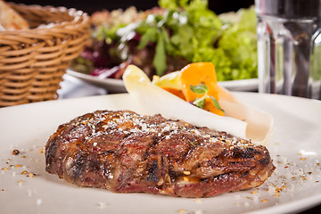 Image showing Grilled beef steak with seasoning