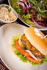 Image showing Cheeseburger with cole slaw