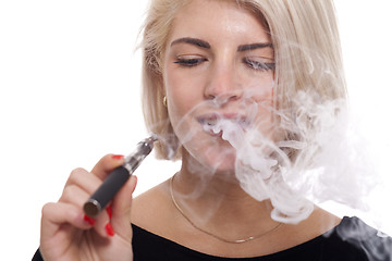 Image showing Close up Blond Woman Smoking Using E- Cigarette