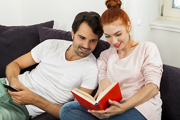 Image showing Couple Resting on the Sofa at the Living Room