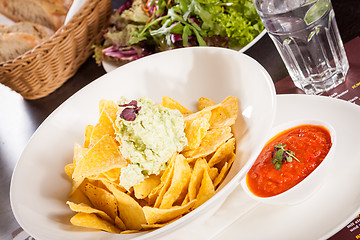 Image showing Crisp corn nachos with guacamole sauce