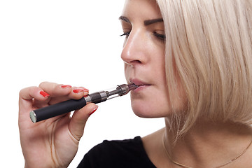 Image showing Close up Blond Woman Smoking Using E- Cigarette