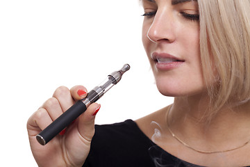 Image showing Close up Blond Woman Smoking Using E- Cigarette