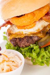 Image showing Delicious egg and bacon cheeseburger