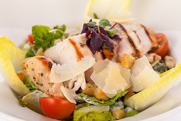 Image showing tasty fresh caesar salad with grilled chicken and parmesan