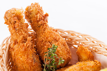 Image showing Crisp crunchy golden chicken legs and wings