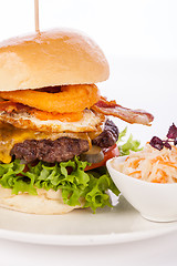 Image showing Delicious egg and bacon cheeseburger