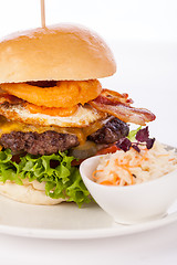 Image showing Delicious egg and bacon cheeseburger