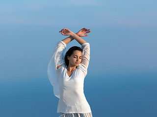 Image showing young woman enjoy sunset