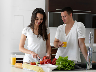 Image showing happy young couple in kicthen