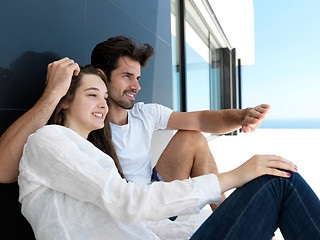 Image showing young couple making selfie together at home