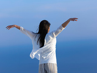 Image showing young woman enjoy sunset