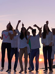 Image showing party people  on sunset