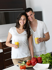 Image showing happy young couple in kicthen