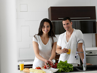 Image showing happy young couple in kicthen