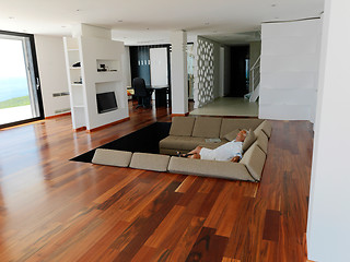 Image showing Portrait of senior man relaxing in sofa