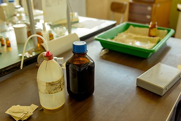 Image showing Old laboratory with a lot of bottles