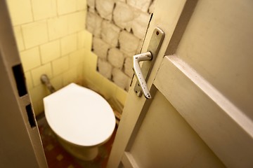 Image showing Used abandoned toilette in grungy room