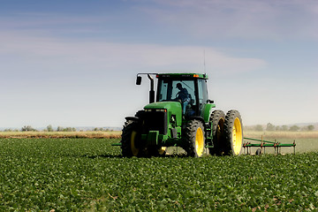 Image showing farmer plowing the field