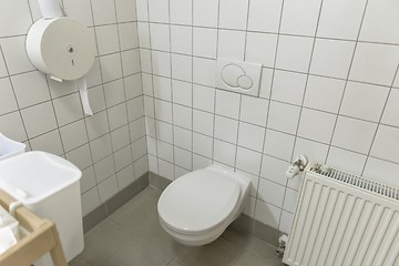 Image showing Opened door with toilet