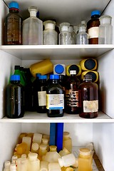 Image showing Old laboratory with a lot of bottles