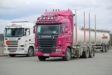 Image showing Pink Scania R620 Logging Truck and White R490 Tank Truck for Eur