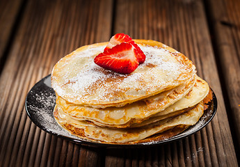 Image showing Crepes with fresh strawberries