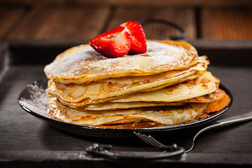 Image showing Crepes with fresh strawberries