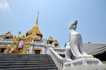 Image showing Singha and temple at Wat Trimit