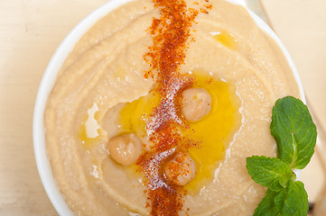 Image showing Hummus with mint on top