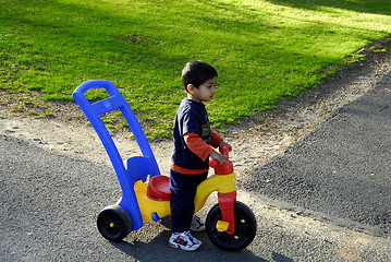 Image showing Kid with Tricycle