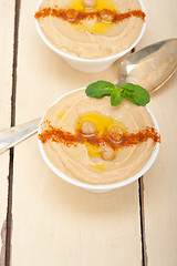 Image showing Hummus with mint on top