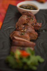 Image showing organic fresh ripe roasted beef meat with sauce