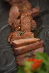 Image showing organic fresh ripe roasted beef meat with sauce