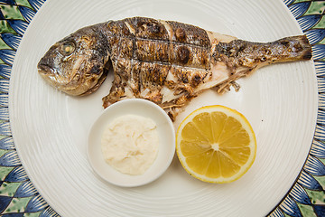 Image showing Grilled fish with lemon 