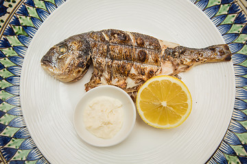 Image showing Grilled fish with lemon 