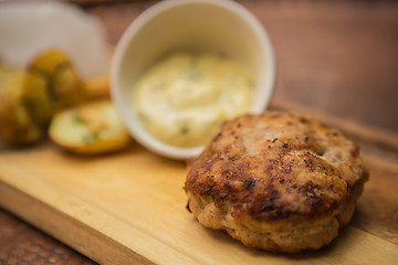 Image showing Succulent cooked beef burger with potato 