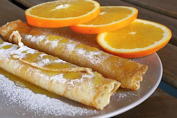 Image showing pancakes with oranges