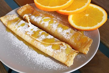 Image showing pancakes with oranges