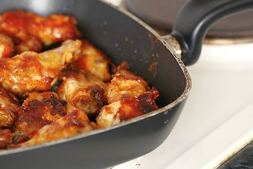Image showing chicken wings in grill pan