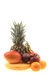 Image showing pineapple mango orange banana and dragon fruit