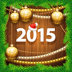 Image showing Happy New Year 2015 on Wooden Background with Christmas Baubles