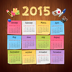 Image showing Office Stickers Calendar 2015 calendar on Wooden Background