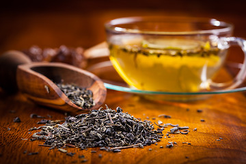 Image showing Dry tea on wooden table