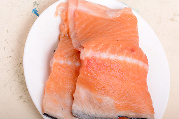 Image showing Fresh uncooked red fish fillet slices