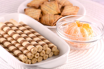 Image showing sweet cake on white plate with lemon