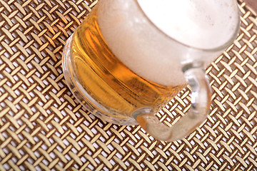 Image showing Glass of fresh beer with cap of foam