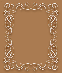 Image showing Vector white frame with curls on a brown background