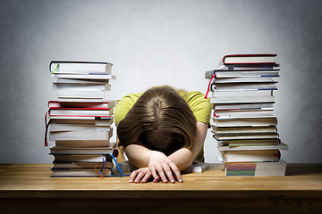 Image showing Overworked female student