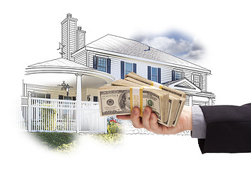 Image showing Hand Holding Thousands In Cash Over House Drawing and Photo